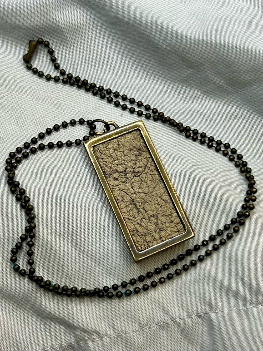 Leather-Panel Rectangular Pendant Necklace in Antique Brass